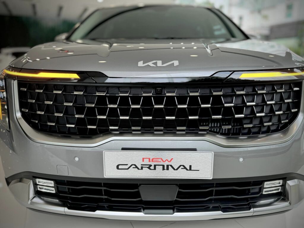 New Carnival 1.6 Turbo Hybrid Premium 7S - ngoai that
